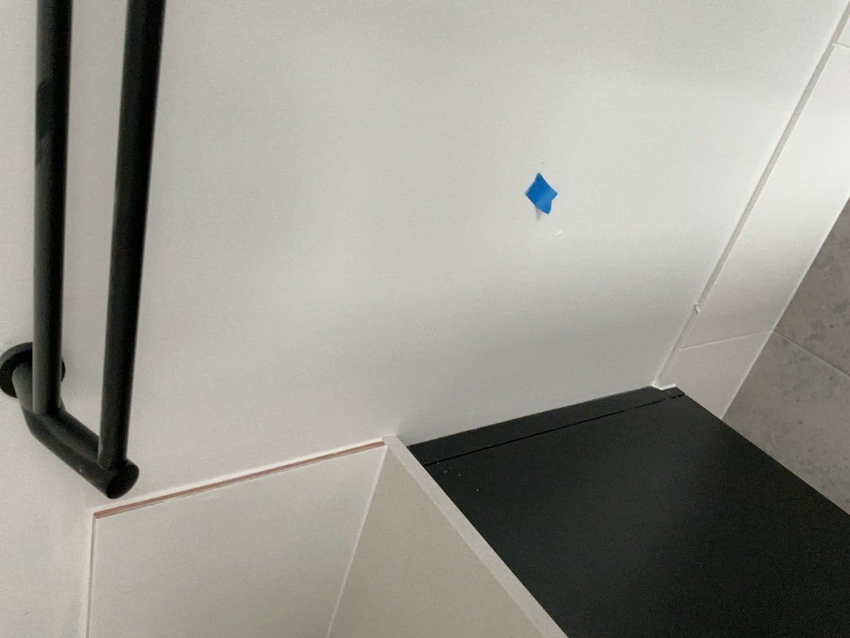 Ensuite painting, recorded at a handover inspection in Oran Park
